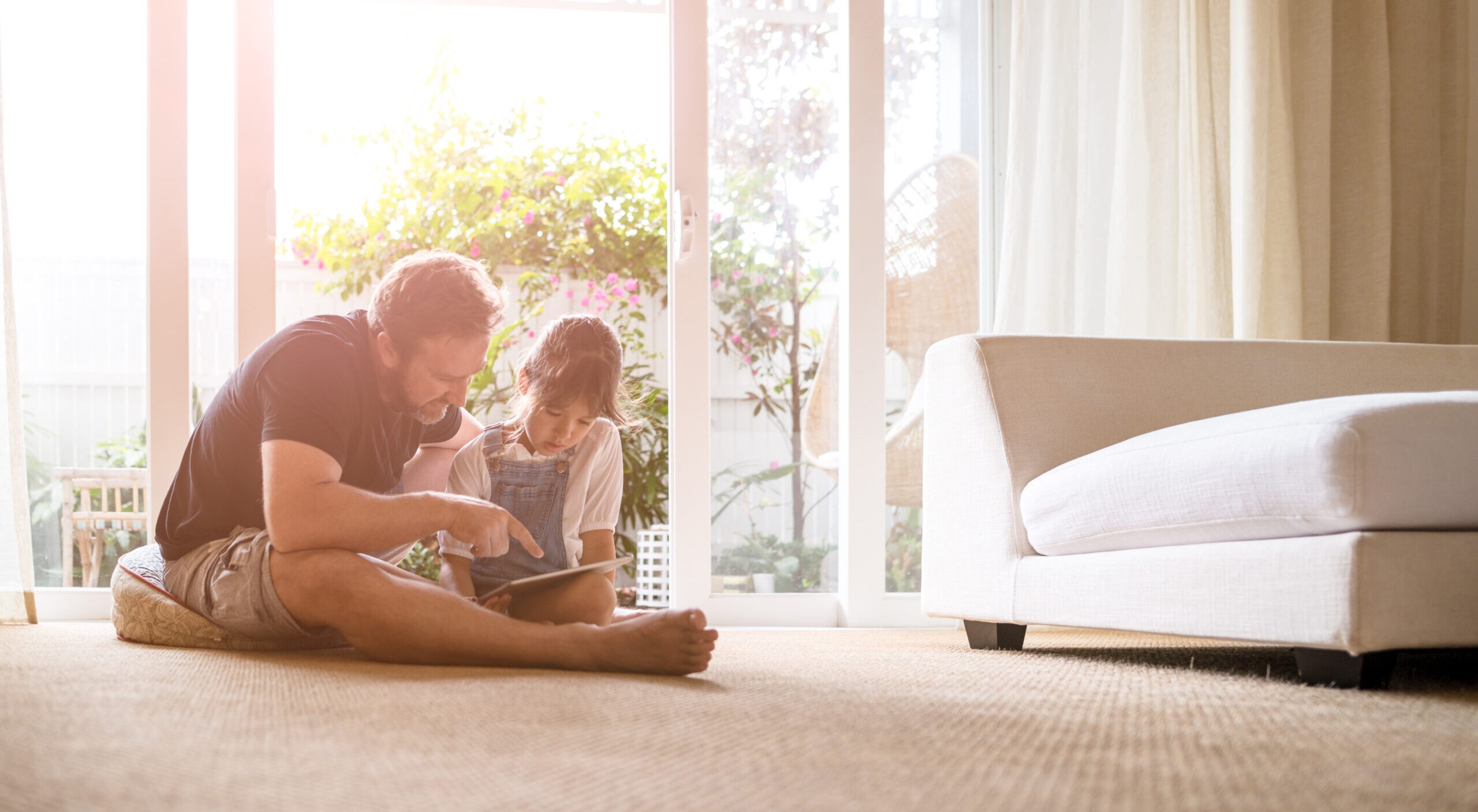 Father and daughter looking at digital tablet. Father and daughter looking at digital tablet.